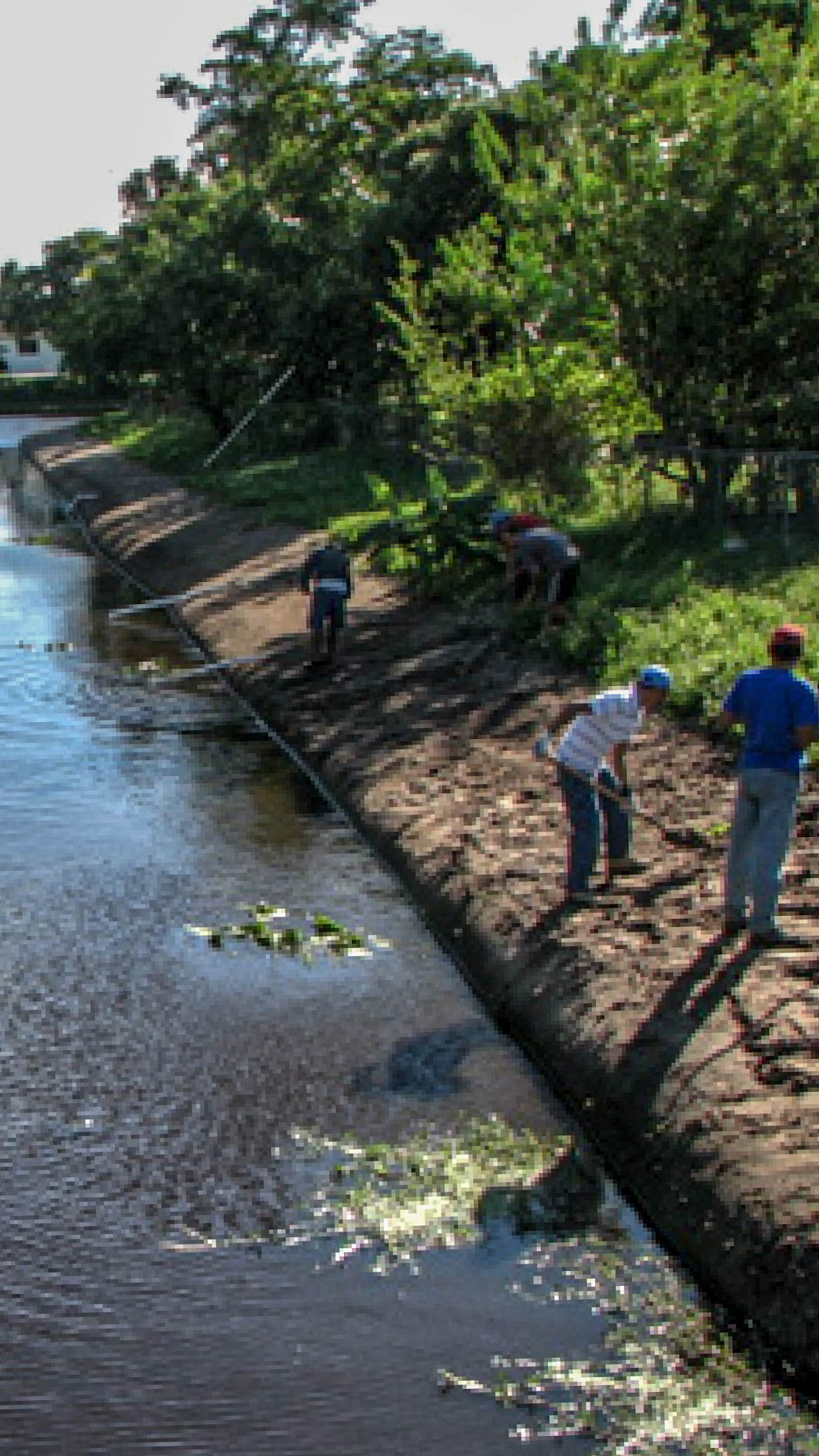 Crew finishing the embankment along a Margate canal restoration