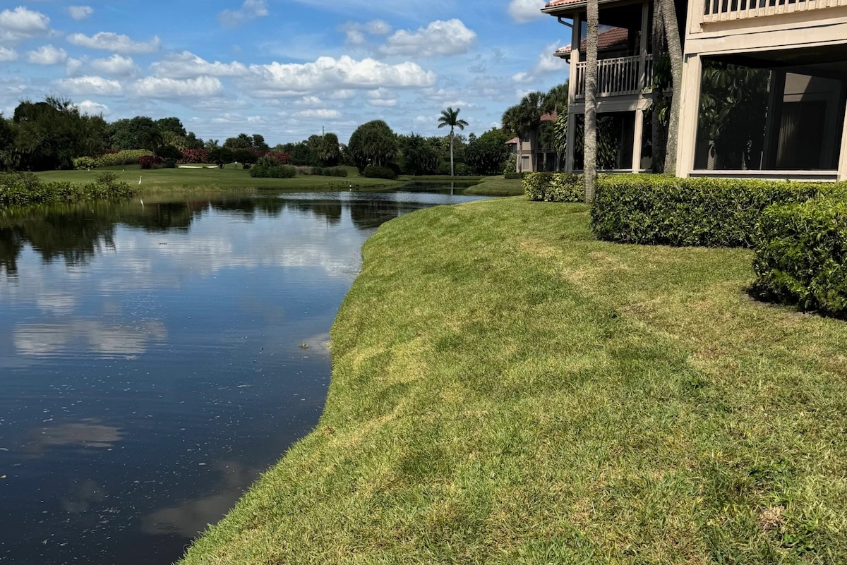 Finished Geo Tube-stabilized shoreline along a Florida residential community
