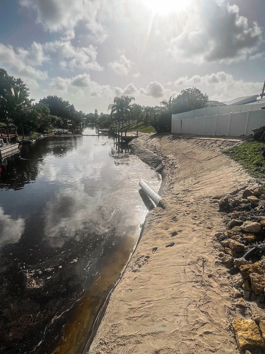 Geo Tubes installed along a Florida canal bank during restoration